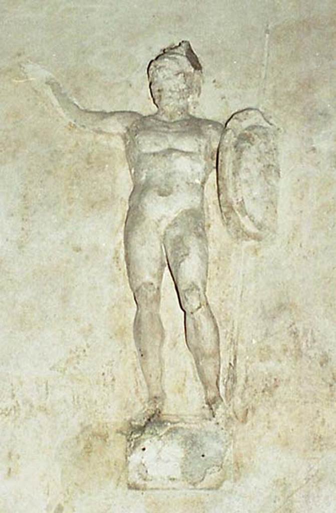 Suburban Baths, Herculaneum. October 2001. 
Detail of stucco warrior with spear and shield, from north end of west wall of tepidarium. 
Photo courtesy of Peter Woods.